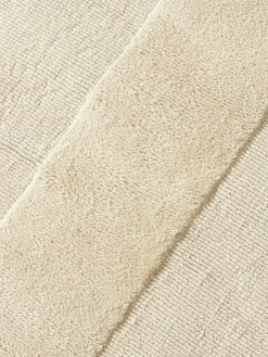 Alfombra artesanal de algodón texturizada Dania