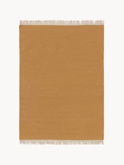 Alfombra artesanal de lana con flecos Liv