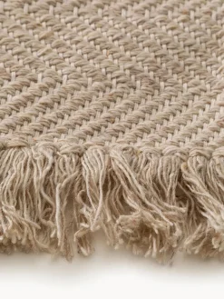 Alfombra artesanal de lana con flecos Lars
