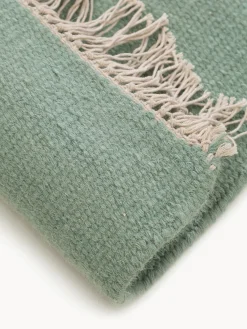 Alfombra artesanal de lana con flecos Liv