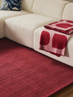 Alfombra artesanal de lana con estampado geométrico Alexia