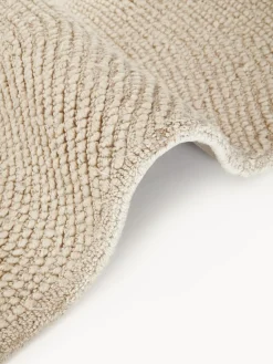 Alfombra de lana redonda artesanal de pelo corto Eleni