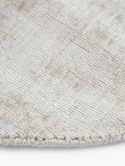 Alfombra redonda artesanal de viscosa Jane