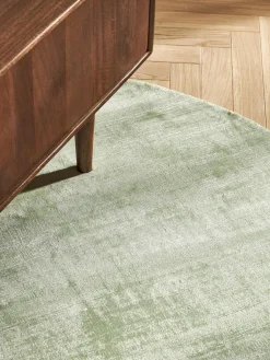 Alfombra redonda artesanal de viscosa Jane