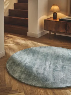 Alfombra redonda artesanal de viscosa Jane