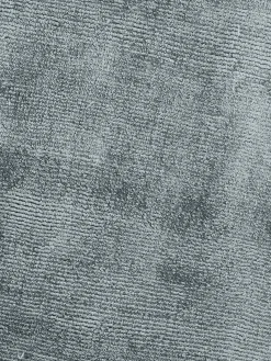 Alfombra redonda artesanal de viscosa Jane