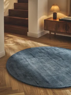 Alfombra redonda artesanal de viscosa Jane