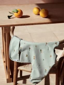 Babero con mangas Merle