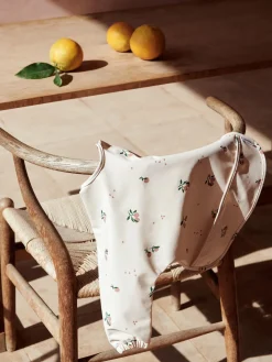 Babero con mangas Merle