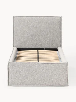 Cama individual tapizada en tejido bouclé con espacio de almacenamiento Dream