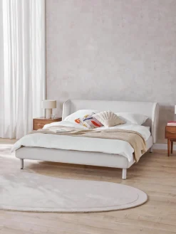 Cama tapizada con cabecero Luma