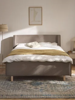 Cama tapizada con espacio de almacenamiento Arche