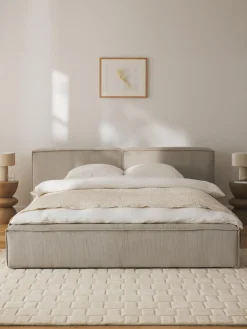 Cama tapizada en pana Lennon, con espacio de almacenamiento