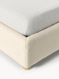 Cama tapizada en tejido bouclé Ebba, con espacio de almacenamiento