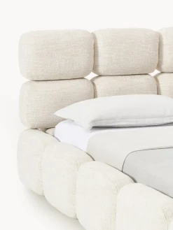Cama tapizada en tejido bouclé con espacio de almacenamiento Tayla