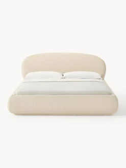 Cama tapizada redondeada en tejido bouclé Alba