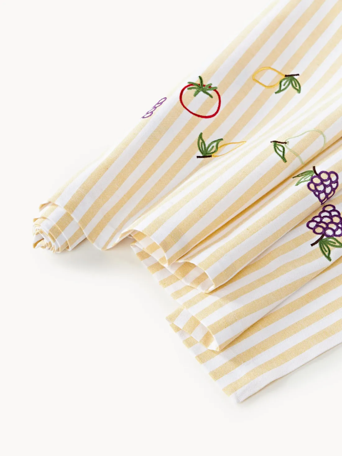 Camino de mesa a rayas con motivos bordados Melony