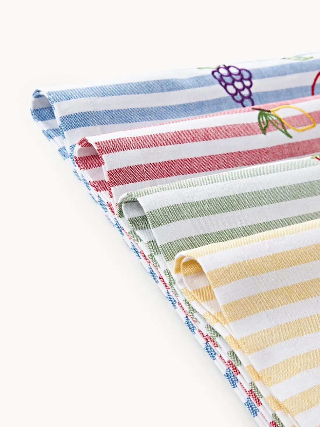 Camino de mesa a rayas con motivos bordados Melony