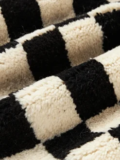 Cojín artesanal de lana Statement