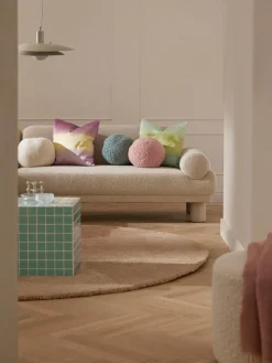 Cojín esférico de borreguillo Dotty