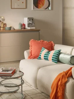 Cojín rulo co flecos Nikita