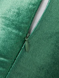 Cojín rulo co flecos Nikita