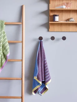 Colgador de metal Flare