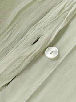 Funda de almohada de percal de algodón lavado Leonora