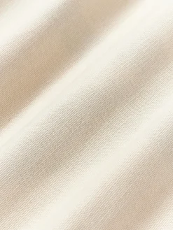 Funda de cojín artesanal con motivos geométricos Asta