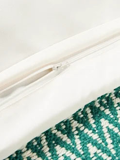 Funda de cojín para exterior con tejido artesanal y flecos Suria