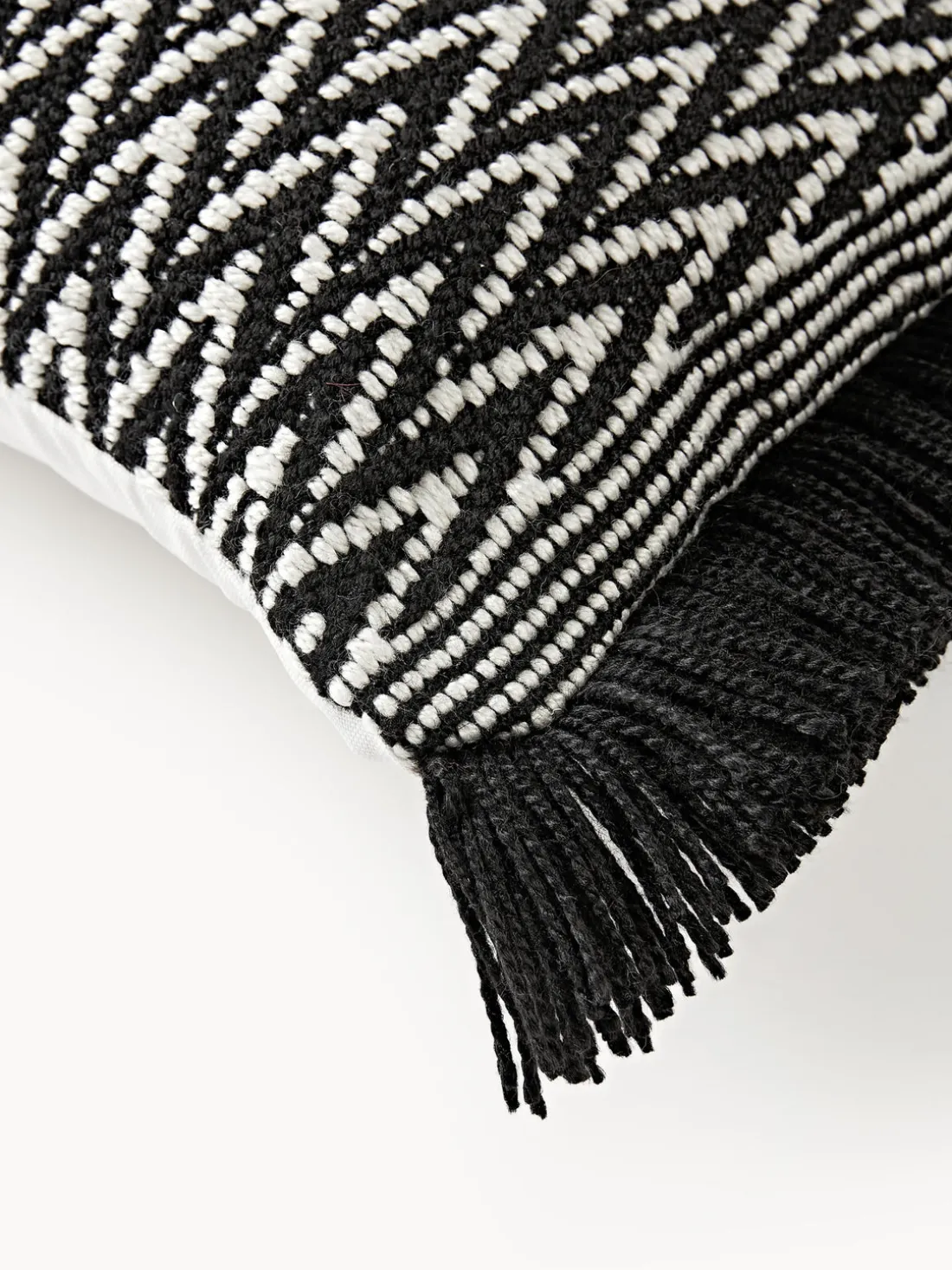 Funda de cojín para exterior con tejido artesanal y flecos Suria