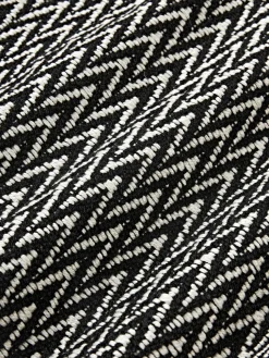 Funda de cojín para exterior con tejido artesanal y flecos Suria