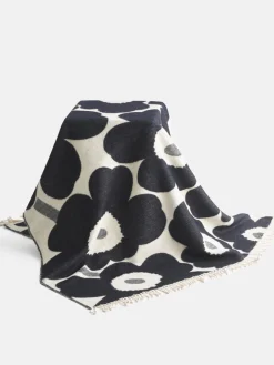 Manta reversible con flecos Unikko