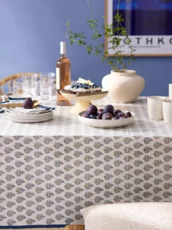 Mantel artesanal con estampado floral Melon