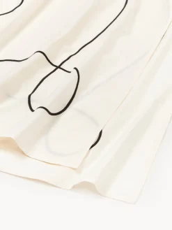 Mantel con bordado abstracto Sue