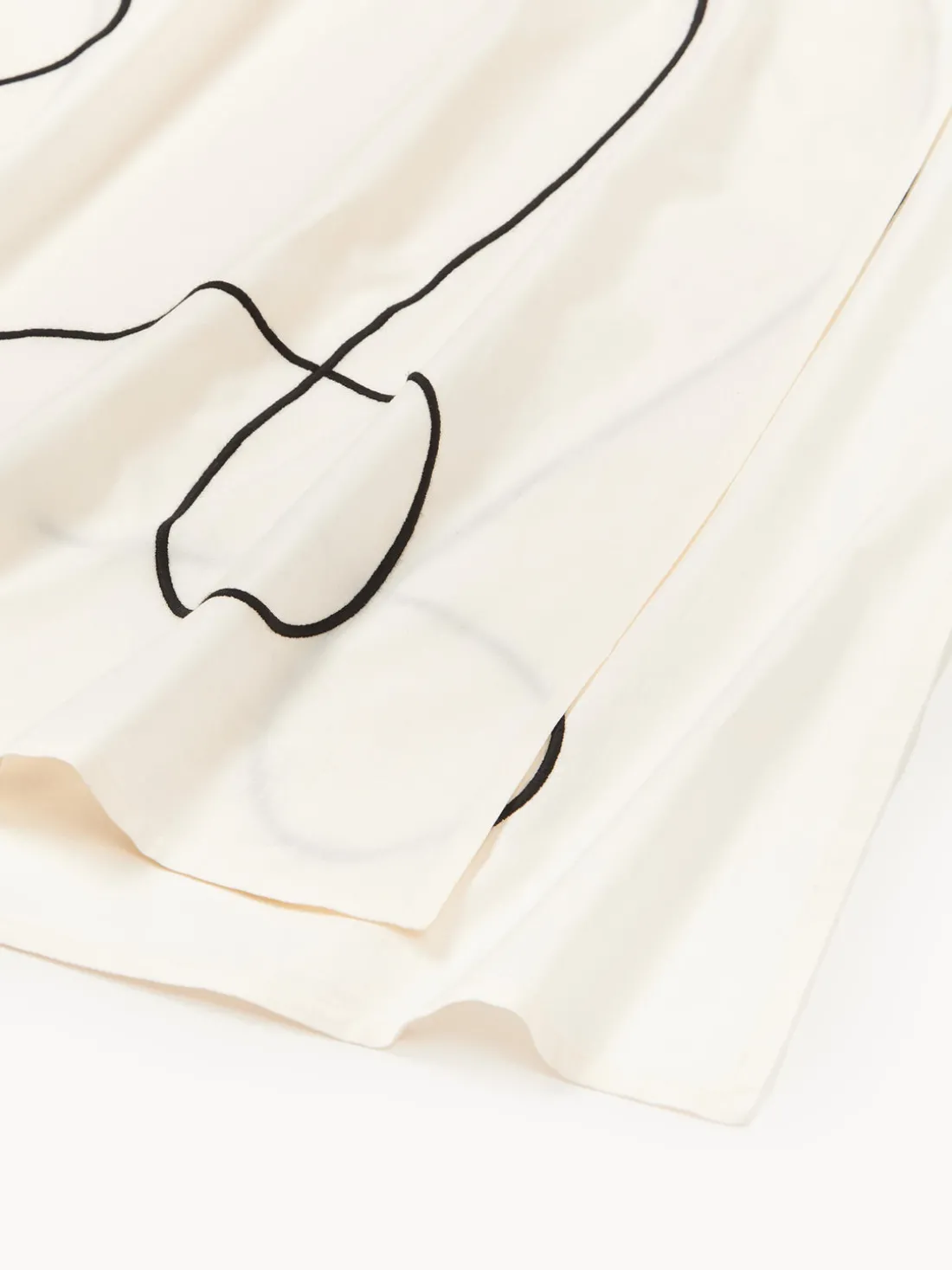 Mantel con bordado abstracto Sue