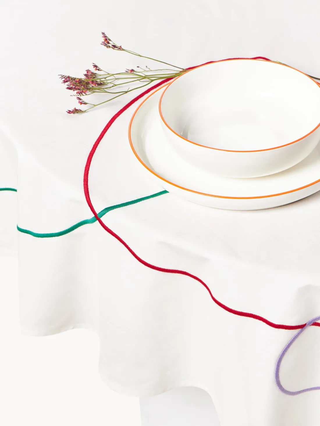 Mantel redondo con bordado abstracto Sue