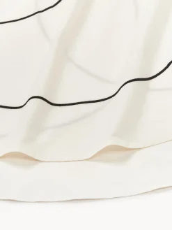 Mantel redondo con bordado abstracto Sue