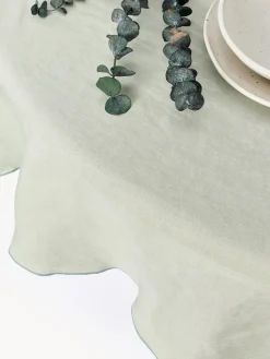 Mantel redondo de lino con ribete Kennedy