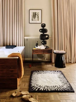 Mesa auxiliar redonda con superficie brillante Dustan