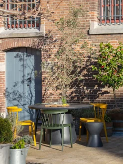 Mesa auxiliar redonda para exterior de cemento Dover