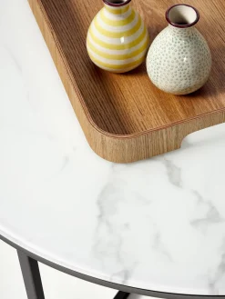 Mesa de centro redonda con tablero de vidrio en look mármol Antigua