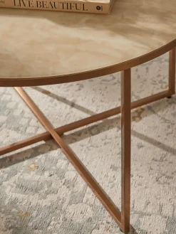 Mesa de centro redonda con tablero de vidrio en look mármol Antigua