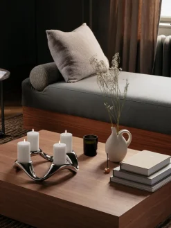 Portavela de acero inoxidable con forma orgánica Cobra