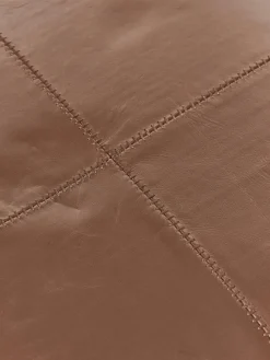 Puf artesanal de cuero Raven