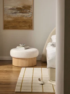 Puf grande tapizado en borreguillo bouclé con espacio de almacenamiento Nala