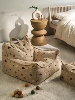Puf infantil artesanal en tejido bouclé Sugar