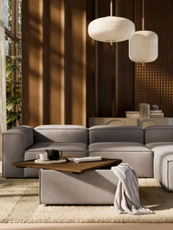 Reposapiés puf con espacio de almacenamiento Lennon