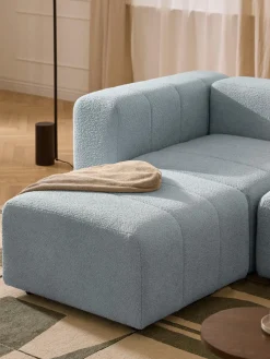 Reposapiés puf en tejido bouclé Lena