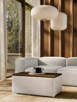 Reposapiés puf en tejido bouclé con espacio de almacenamiento Lennon